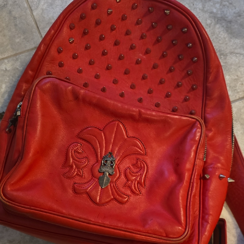 Red Studded Backpack with Embroidered Design